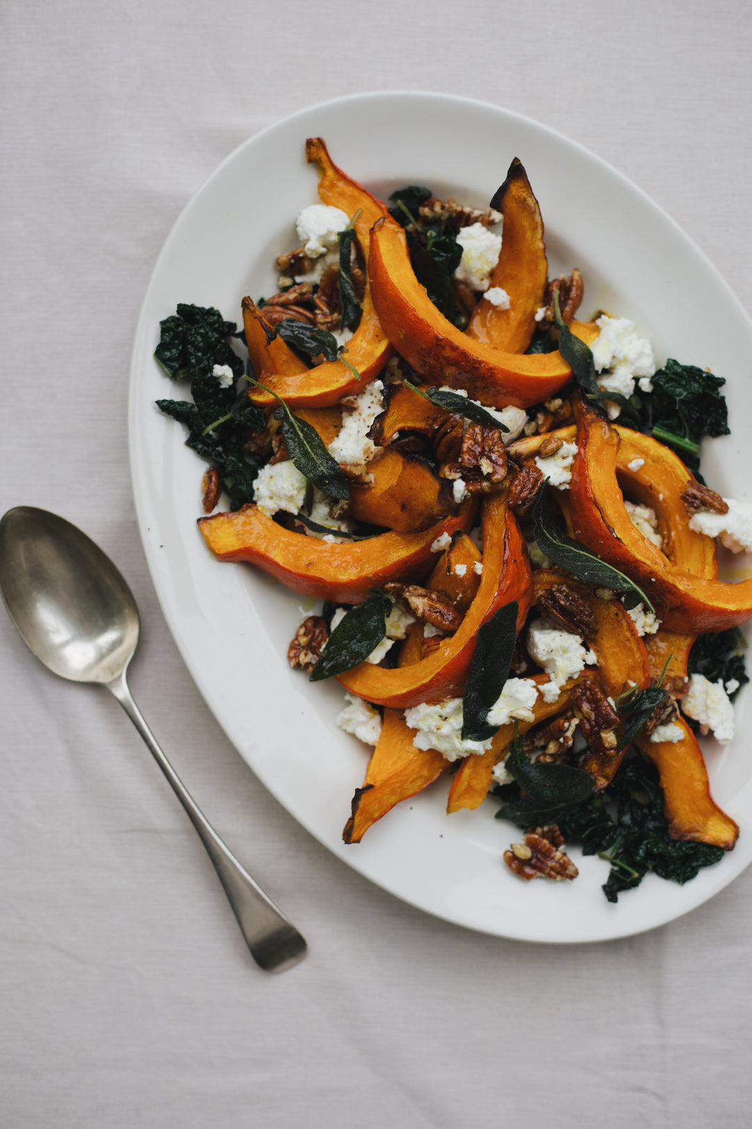 Roasted Squash Salad with Leafy Greens, Goats Cheese, Honeyed Nuts & Crispy Sage